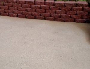 After photo power washing concrete patio and retaining wall in Reisterstown Baltimore County MD 21136